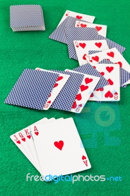 Poker  Cards On Green Baize Casino Stock Photo