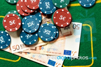 Poker Chips And Bills Stock Photo