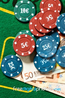 Poker Chips And Bills Stock Photo