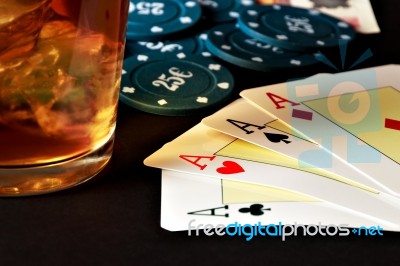 Poker, Whiskey And Money Stock Photo