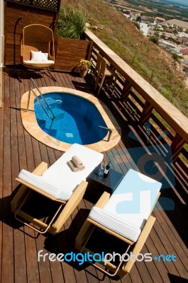 Pool Deck With Lounge Chairs Stock Photo