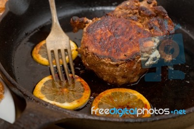 Pork Chop Seared On Iron Skillet Stock Photo