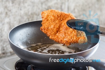 Pork Fried In A Pan Stock Photo