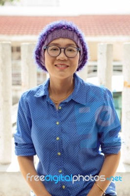 Portrait Happiness Face Of Asian Woman Wearing Knitting Hood Toothy Smiling Wiht Relax Emotion Stock Photo