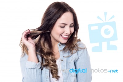 Portrait Of A Shy Young Woman Stock Photo