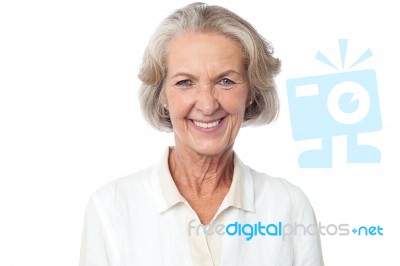 Portrait Of A Smiling Senior Woman Stock Photo