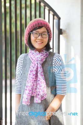 Portrait Of Beautiful 40s Years Asian Woman Wearing Wool Hood And Silk Scarf Toothy Smiling With Happiness Face Emotion Stock Photo