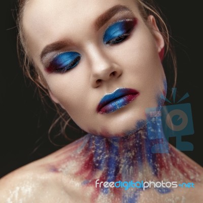 Portrait Of Beautiful Girl With Blue Tones Makeup Stock Photo