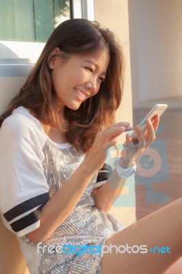 Portrait Of Beautiful Teen Woman Chat Social Media On Smrt Phone… Stock Photo