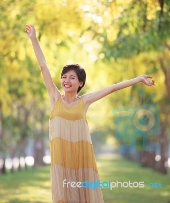 Portrait Of Beautiful Young Asian Woman Feeling Free With Relaxi… Stock Photo