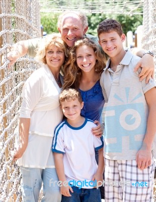 Portrait Of Family On Hanging Bridge Stock Photo