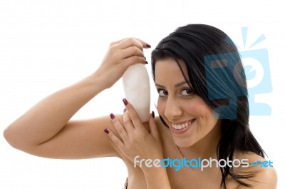 Portrait Of Female With Lotion Bottle Stock Photo