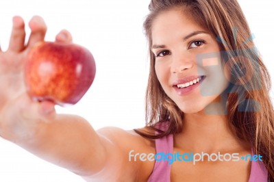 Portrait Of Happy Girl Showing Red Apple Stock Photo