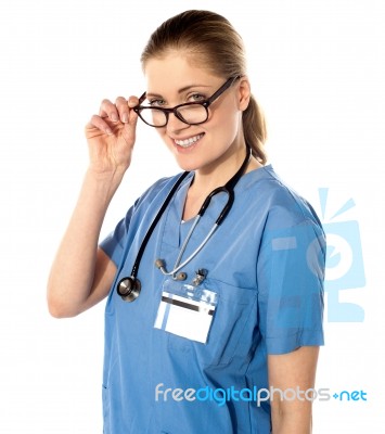 Portrait Of Happy Smiling Young Female Doctor Stock Photo