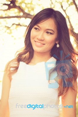 Portrait Of Pretty Asian Woman Smiling Stock Photo