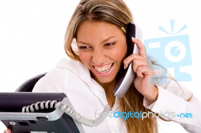 Portrait Of Smiling Businesswoman Busy On Phone Stock Photo