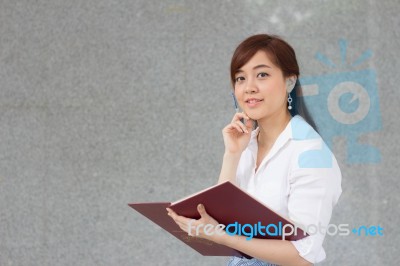 Portrait Of Thai Adult Businesswoman Beautiful Girl Read A Book Stock Photo