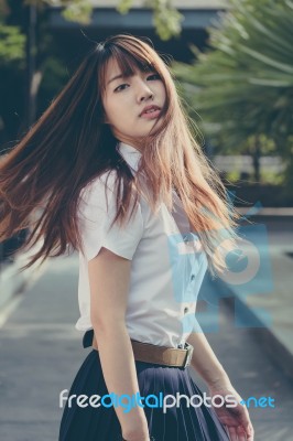 Portrait Of Thai Adult Student University Uniform Beautiful Girl Relax And Smile Stock Photo