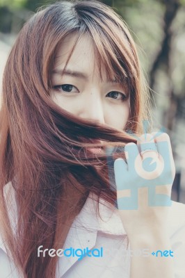 Portrait Of Thai Adult Student University Uniform Beautiful Girl Relax And Smile Stock Photo