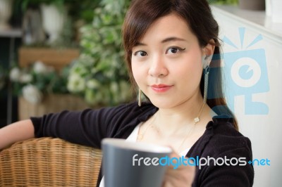 Portrait Of Thai Adult Women Office Beautiful Girl Drinking Coffee Stock Photo