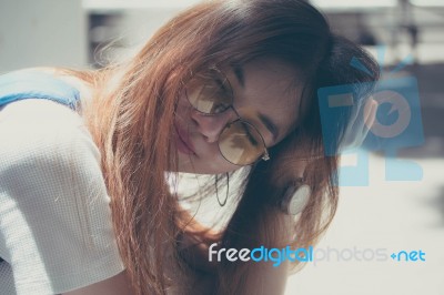Portrait Of Thai Chinese Adult Glasses Beautiful Girl Denim Blue Bag Relax And Smile Stock Photo