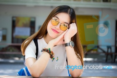 Portrait Of Thai Chinese Adult Glasses Beautiful Girl Denim Blue Bag Relax And Smile Stock Photo