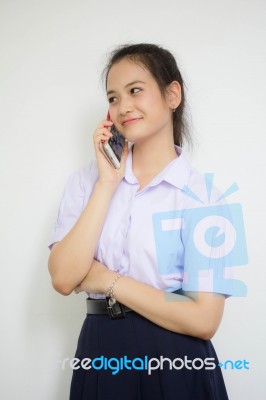 Portrait Of Thai High School Student Uniform Teen Beautiful Girl Calling Smart Phone, Stock Photo