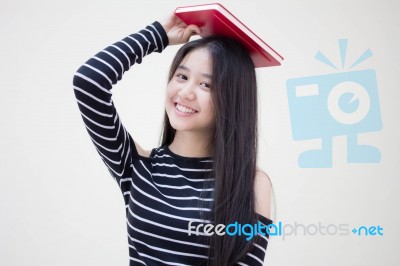 Portrait Of Thai Teen Beautiful Girl Reading Book Stock Photo