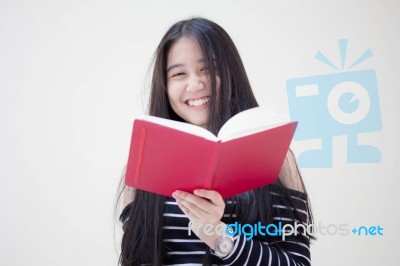 Portrait Of Thai Teen Beautiful Girl Reading Book Stock Photo