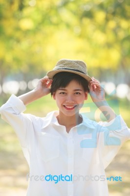 Portrait Of Young Beautiful Asian Woman Wearing Fashion Straw Ha… Stock Photo