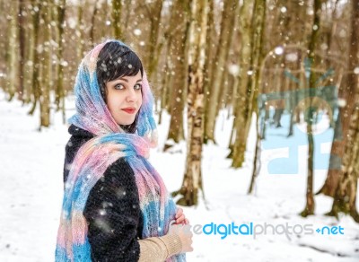 Portrait Of Young Beautiful Woman Walking In The Woods Stock Photo