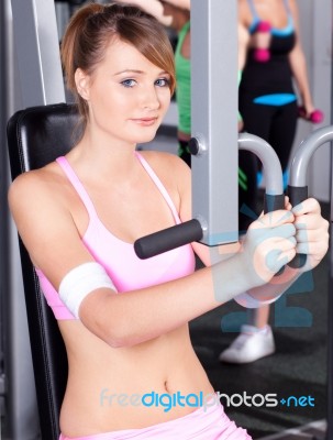 Portrait Of Young Female Exercising Stock Photo