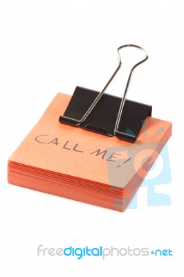 Post-it Note With Clip And Message Call Me On White Background Stock Photo