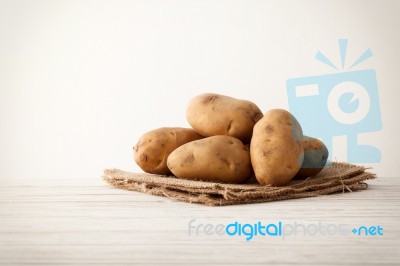 Potato Still Life On Wood Background Stock Photo