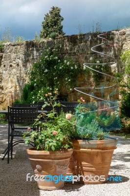 Potted Plants In A Restaurant In Pienza Stock Photo