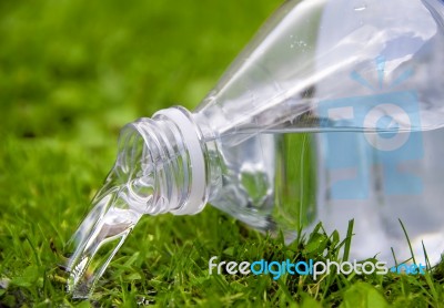 Pouring Water From Bottle Stock Photo