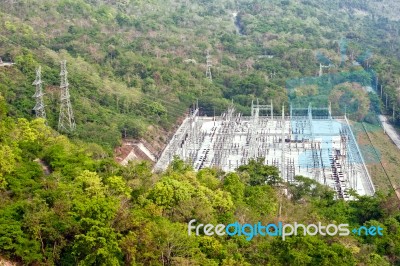 Power Plant In Deep Green Rain Forest Stock Photo