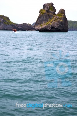 Prayer Monkey Rock In Thailand Kho Phangan  Bay Abstract Boat Stock Photo
