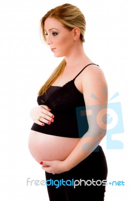 Pregnant Lady Standing Stock Photo