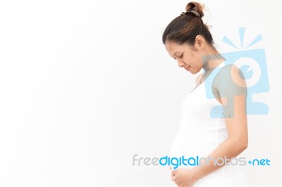 Pregnant Lady Touching Her Belly Stock Photo