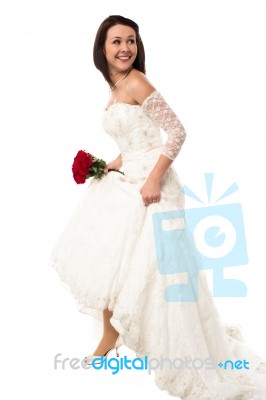 Pretty Bride Turns Back And Moving Forward Stock Photo