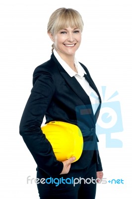 Pretty Business Architect With Yellow Safety Helmet In Hand Stock Photo