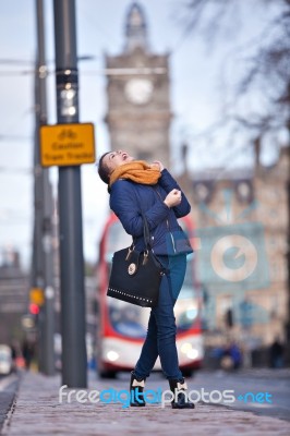 Pretty Girl Walking On The Road Stock Photo