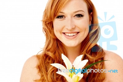 Pretty Lady Posing With Lily Flower Stock Photo