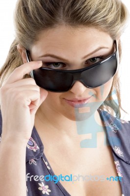 Pretty Model Holding Sunglasses Stock Photo