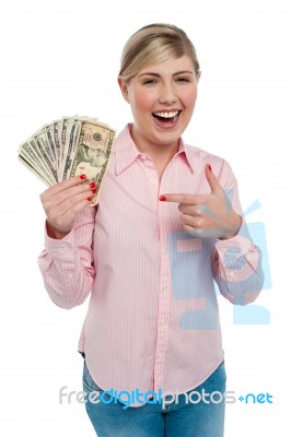 Pretty Woman Holding Up Dollar Notes Stock Photo