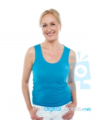 Pretty Woman In Bright Blue Sleeveless Top Stock Photo