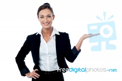 Pretty Woman Promoting Business Product Stock Photo