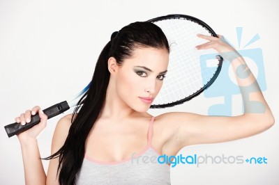 Pretty Woman With Tennis Racket Stock Photo