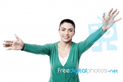 Pretty Woman With Wide Open Arms Stock Photo